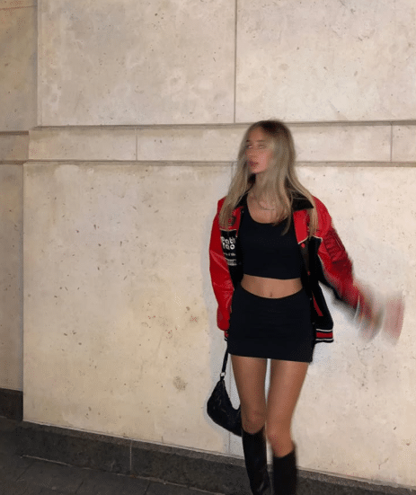 35. Black Crop Top, Mini Skirt, and Racer Jacket