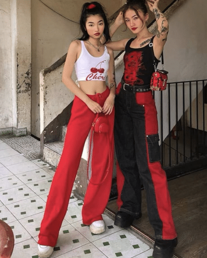 38. Black Tank Top, Cutout Sleeves, and Red Cargo Pants